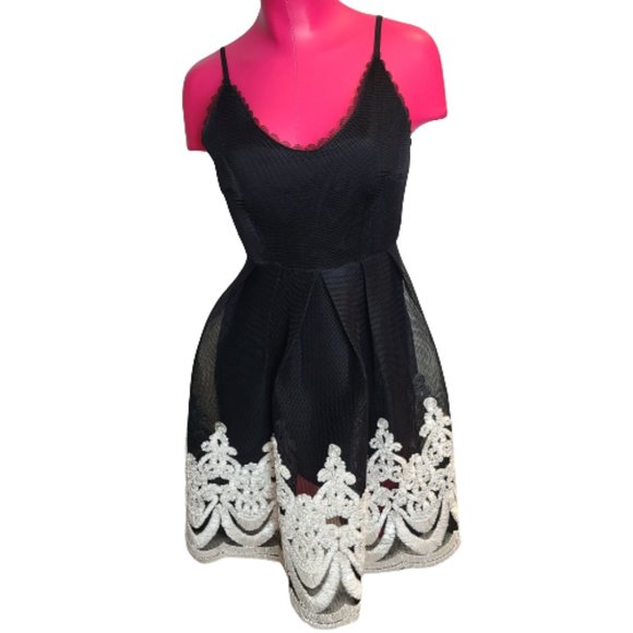 Stunning Black Cocktail Dress with White Accents by Jenn - Picture 2 of 16